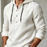 Men's Solid Color Linen Long Sleeve Hooded Henley Shirt, Spring/Autumn Casual Textured Fabric Pullover Top, Contrast Color Adjustable Drawstring Hood, Half-Button Placket, Roll-Up Long Sleeves, Loose Fit Basic Linen Sweatshirt, Suitable for Outdoor